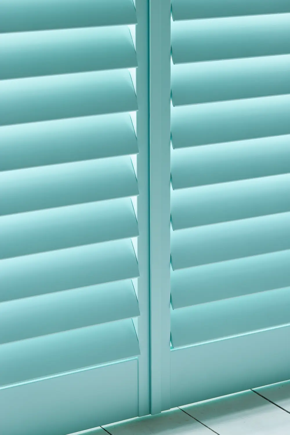 paulownia custom icy blue french door shutters close up