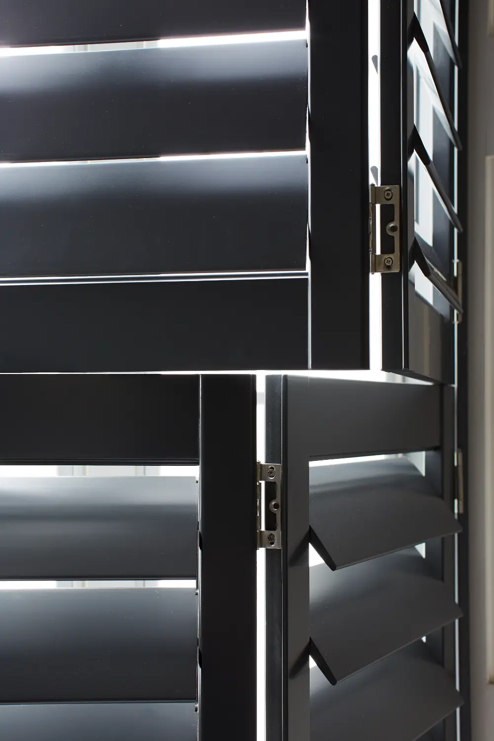 tier on tier shutters black close up